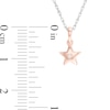 Diamond Accent Star and Star Outline Pendant Set in Sterling Silver and 10K Rose Gold