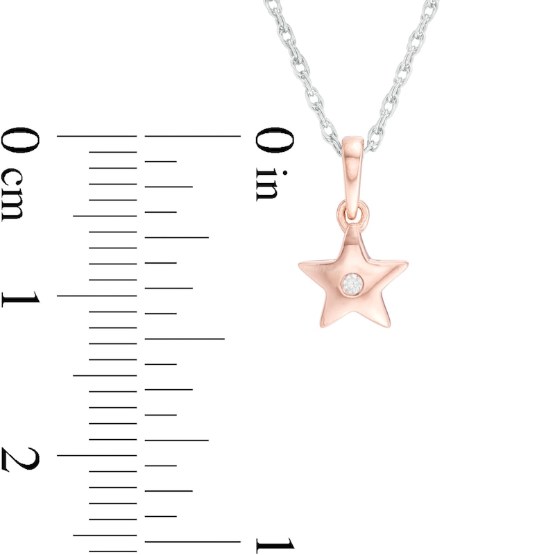 Diamond Accent Star and Star Outline Pendant Set in Sterling Silver and 10K Rose Gold