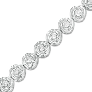 0.086 CT. T.W. Diamond Love Knot Tennis Bracelet in Sterling Silver - 7.5"