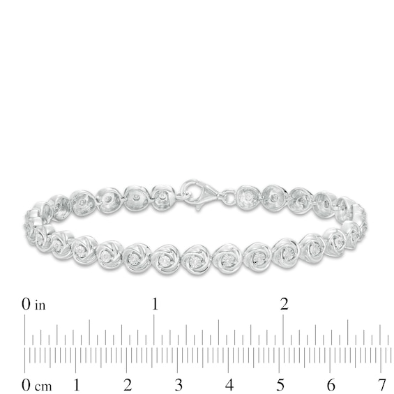 0.086 CT. T.W. Diamond Love Knot Tennis Bracelet in Sterling Silver - 7.5"