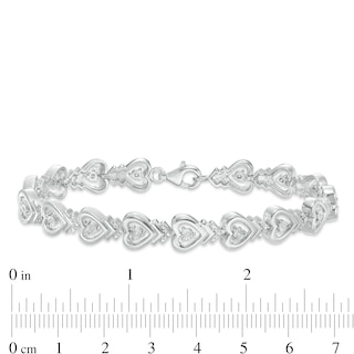 0.115 CT. T.W. Diamond Sideways Heart with Chevron Bracelet in Sterling Silver - 7.5"