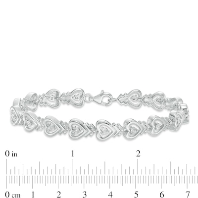 0.115 CT. T.W. Diamond Sideways Heart with Chevron Bracelet in Sterling Silver - 7.5"