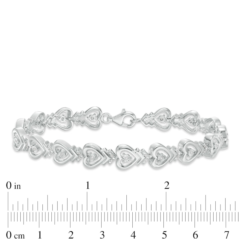 0.115 CT. T.W. Diamond Sideways Heart with Chevron Bracelet in Sterling Silver - 7.5"|Peoples Jewellers