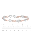 Thumbnail Image 3 of 0.085 CT. T.W. Diamond Alternating Heart and Infinity Link Bracelet in Sterling Silver and 10K Rose Gold - 7.25"