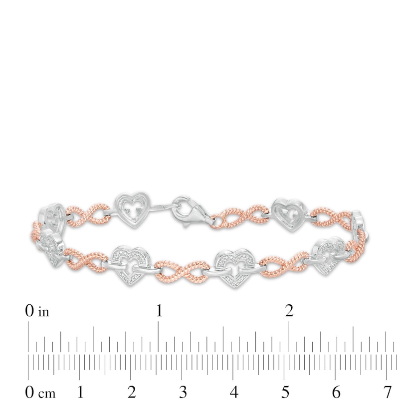 0.085 CT. T.W. Diamond Alternating Heart and Infinity Link Bracelet in Sterling Silver and 10K Rose Gold - 7.25"