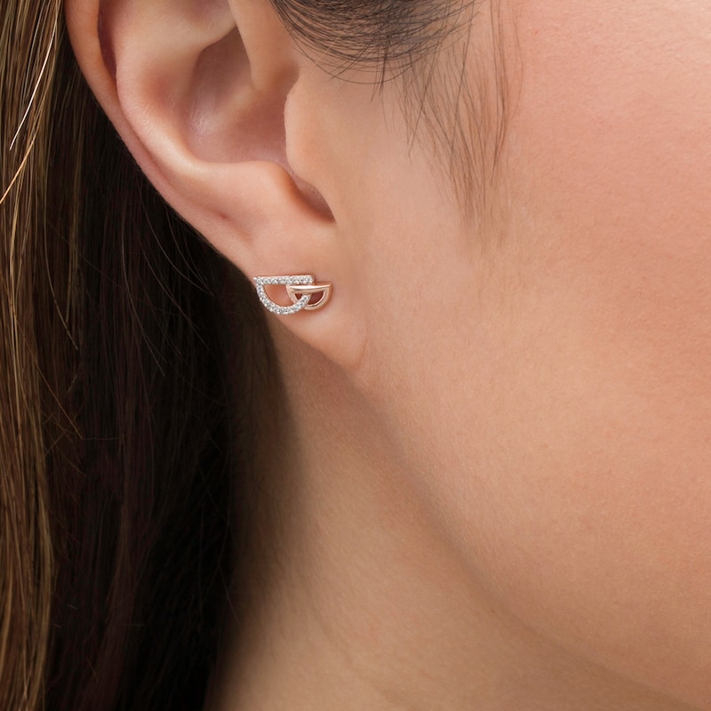 0.04 CT. T.W. Diamond Interlocking Half Circle Stud Earrings in 10K Rose Gold