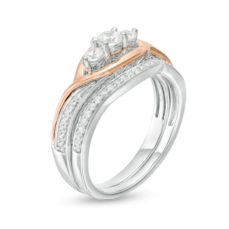0.45 CT. T.W. Diamond Three Stone Open Bypass Bridal Set in 10K Two-Tone Gold|Peoples Jewellers
