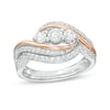 Thumbnail Image 0 of 0.58 CT. T.W. Diamond Three Stone Open Bypass Bridal Set in 10K Two-Tone Gold