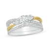 Thumbnail Image 0 of 0.23 CT. T.W. Diamond Three Stone Split Shank Bridal Set in Sterling Silver with 14K Gold Plate