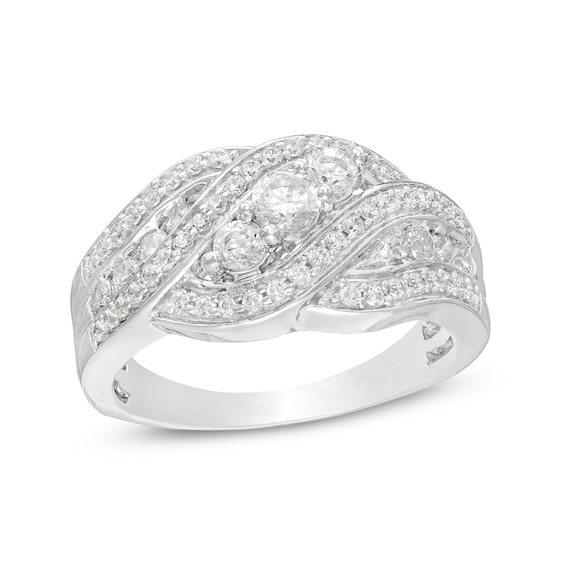 0.69 CT. T.W. Diamond Three Stone Wavy Bypass Engagement Ring in 10K White Gold