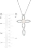 4.0mm Lab-Created Opal and 0.087 CT. T.W. Diamond Twisted Cross Pendant in Sterling Silver