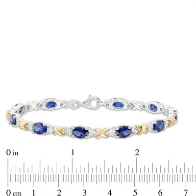 Oval Lab-Created Blue Sapphire and 0.086 CT. T.W. Diamond "X" Bracelet in Sterling Silver and 14K Gold Plate - 7.25"