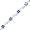 Thumbnail Image 0 of Lab-Created Blue Sapphire Flower and Wave Link Bracelet in Sterling Silver - 7.5"