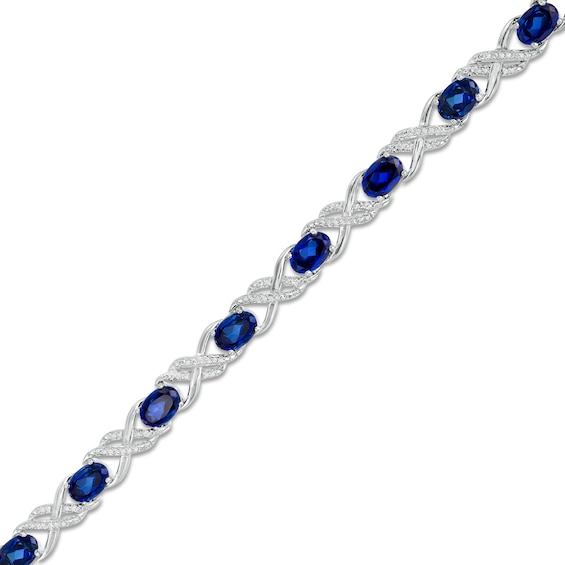 Oval Lab-Created Blue Sapphire and 0.23 CT. T.W. Diamond Double Infinity Bracelet in Sterling Silver - 7.25"