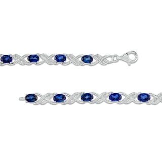 Oval Lab-Created Blue Sapphire and 0.23 CT. T.W. Diamond Double Infinity Bracelet in Sterling Silver - 7.25"