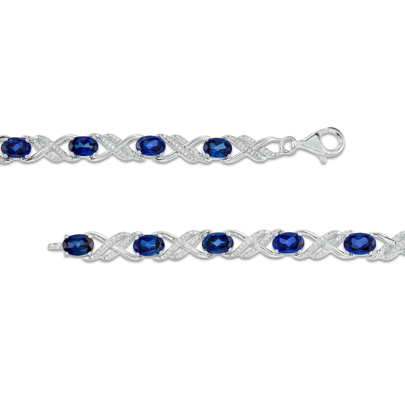 Oval Lab-Created Blue Sapphire and 0.23 CT. T.W. Diamond Double Infinity Bracelet in Sterling Silver - 7.25"|Peoples Jewellers