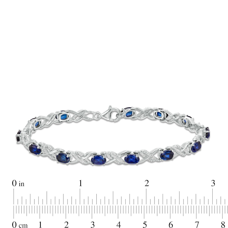 Oval Lab-Created Blue Sapphire and 0.23 CT. T.W. Diamond Double Infinity Bracelet in Sterling Silver - 7.25"|Peoples Jewellers