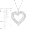 0.95 CT. T.W. Baguette and Round Diamond Double Row Heart Pendant in 10K Gold