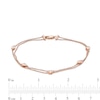 0.23 CT. T.W. Pear-Shaped Diamond Station Double Strand Bracelet in 10K Rose Gold - 7.25"