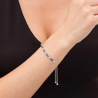 Lab-Created Blue Sapphire and 0.065 CT. T.W. Diamond Three Stone "X" and "O" Bolo Bracelet in Sterling Silver - 9.5"