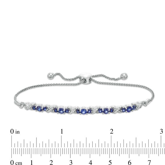 Lab-Created Blue Sapphire and 0.065 CT. T.W. Diamond Three Stone "X" and "O" Bolo Bracelet in Sterling Silver - 9.5"