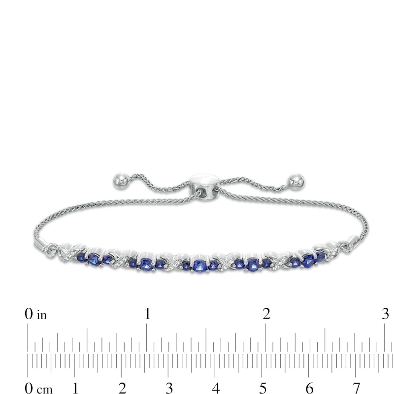 Lab-Created Blue Sapphire and 0.065 CT. T.W. Diamond Three Stone "X" and "O" Bolo Bracelet in Sterling Silver - 9.5"|Peoples Jewellers