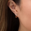 Thumbnail Image 2 of Oval Madeira Citrine and 0.08 CT. T.W. Diamond &quot;X&quot; Drop Earrings in 10K Gold