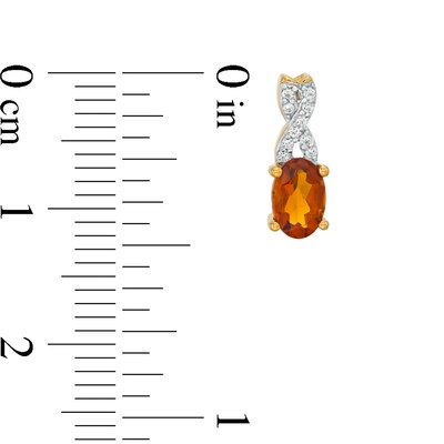 Oval Madeira Citrine and 0.08 CT. T.W. Diamond "X" Drop Earrings in 10K Gold