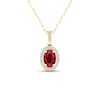 Oval Ruby and 0.08 CT. T.W. Diamond Frame Pendant in 10K Gold