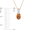 Oval Madeira Citrine and 0.04 CT. T.W. Diamond "X" Drop Pendant in 10K Gold