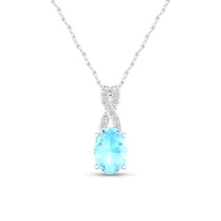 Oval Aquamarine and 0.04 CT. T.W. Diamond "X" Drop Pendant in 10K White Gold