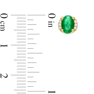 Oval Emerald and 0.04 CT. T.W. Diamond Collar Stud Earrings in 10K Gold