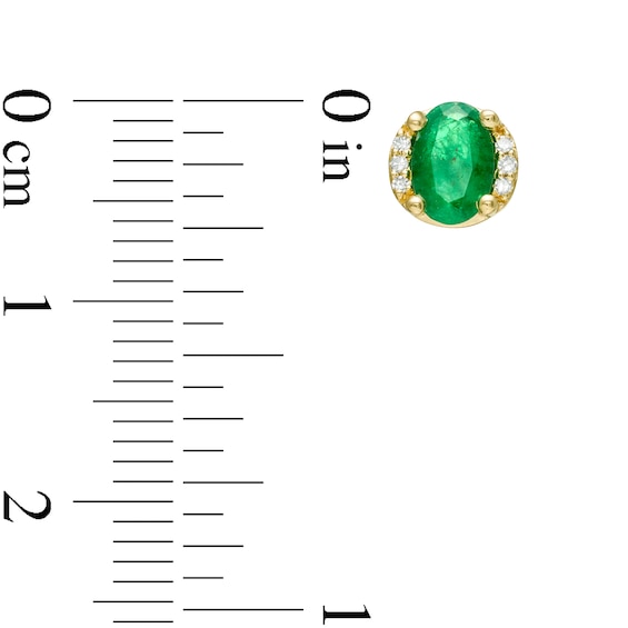 Oval Emerald and 0.04 CT. T.W. Diamond Collar Stud Earrings in 10K Gold