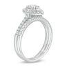 0.98 CT. T.W. Pear-Shaped Multi-Diamond Frame Bridal Set in 10K White Gold