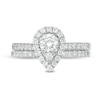 0.98 CT. T.W. Pear-Shaped Multi-Diamond Frame Bridal Set in 10K White Gold