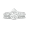 0.69 CT. T.W. Composite Pear-Shaped Diamond Bridal Set in 10K Gold