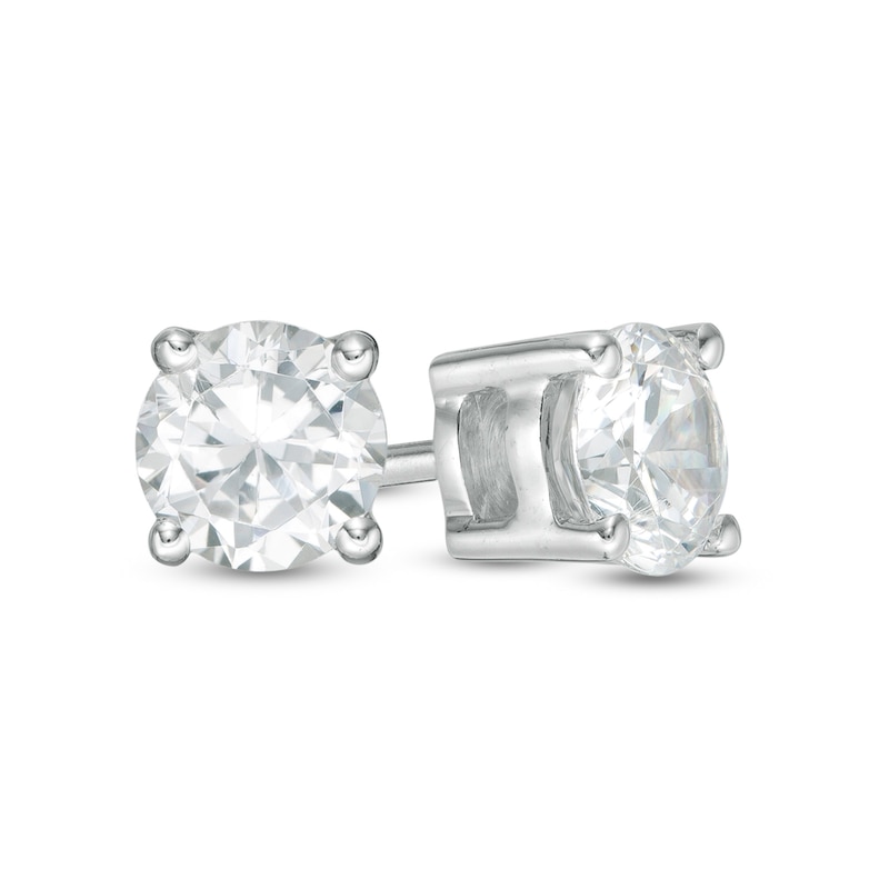 Main Image 1 of 0.69 CT. T.W. Diamond Solitaire Stud Earrings in 14K White Gold