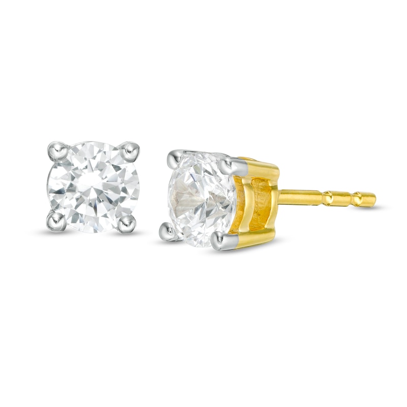 Main Image 1 of 0.58 CT. T.W. Diamond Solitaire Stud Earrings in 14K Gold