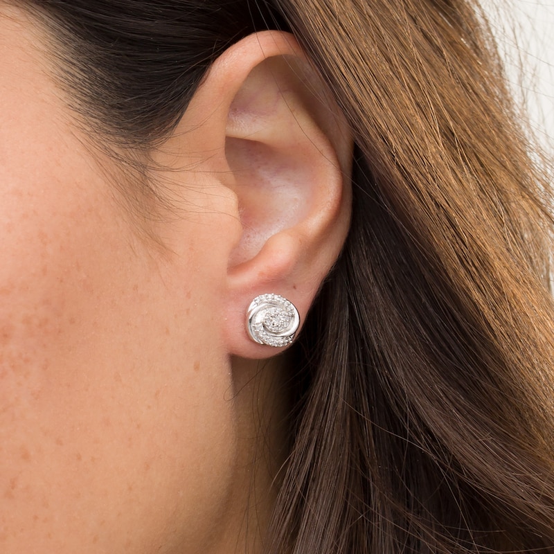 0.145 CT. T.W. Composite Diamond Swirl Stud Earrings in 10K Gold|Peoples Jewellers