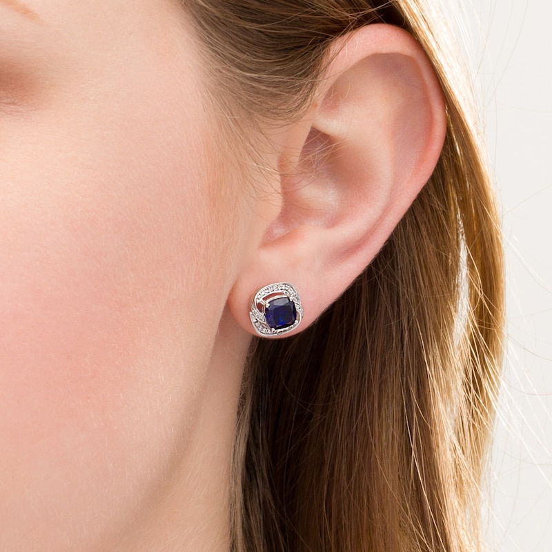 6.0mm Cushion-Cut Lab-Created Blue Sapphire and 0.085 CT. T.W. Diamond Swirl Frame Stud Earrings in Sterling Silver|Peoples Jewellers