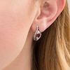 Thumbnail Image 1 of Oval Garnet and 0.115 CT. T.W. White and Black Diamond Bypass Frame J-Hoop Earrings in Sterling Silver