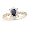 Thumbnail Image 0 of Oval Blue Sapphire and 0.10 CT. T.W. Diamond Starburst Frame Vintage-Style Ring in 10K Gold