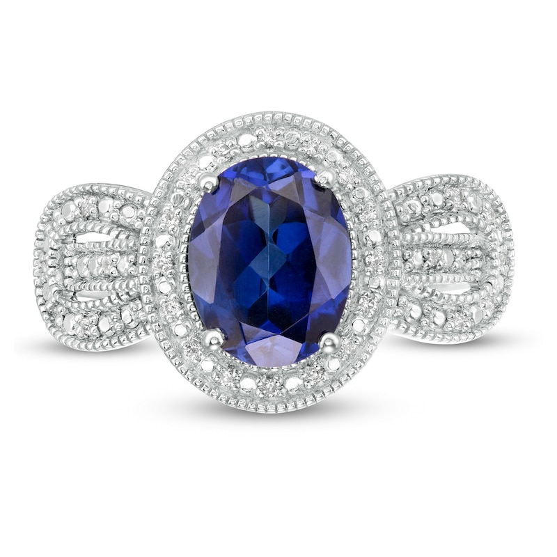 Oval Lab-Created Blue Sapphire and 0.065 CT. T.W. Diamond Vintage-Style Buckle Loop Ring in Sterling Silver