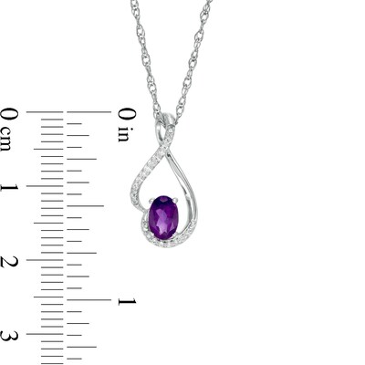 Oval Amethyst and 0.04 CT. T.W. Diamond Teardrop Pendant in 10K White Gold