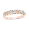 0.12 CT. T.W. Baguette and Round Diamond Stackable Spiral Anniversary Ring in 10K Rose Gold