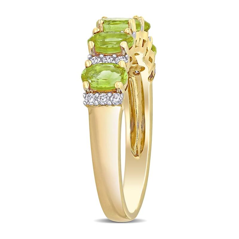 Oval Peridot and 0.16 CT. T.W. Diamond Five Stone Ring in 14K Gold