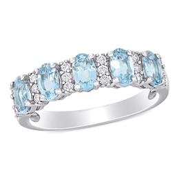 Oval Aquamarine and 0.16 CT. T.W. Diamond Five Stone Ring in 14K White Gold