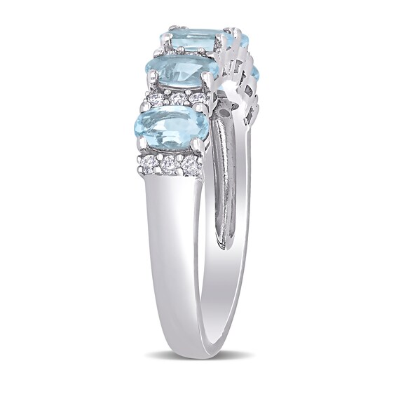 Oval Aquamarine and 0.16 CT. T.W. Diamond Five Stone Ring in 14K White Gold