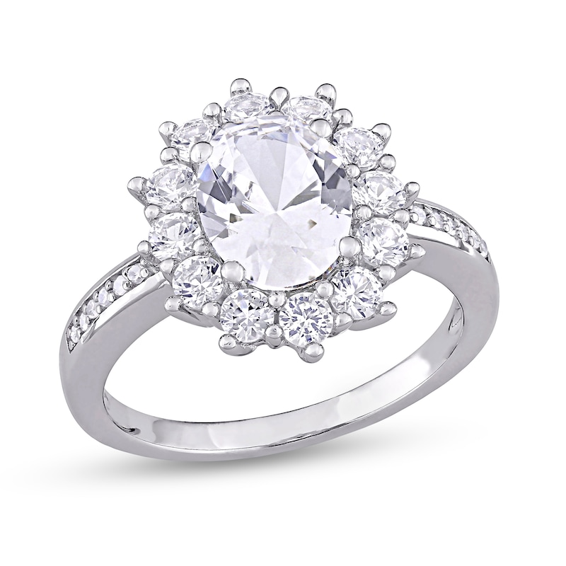 Oval Lab-Created White Sapphire and 0.04 CT. T.W. Diamond Starburst Frame Ring in Sterling Silver|Peoples Jewellers