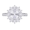 Oval Lab-Created White Sapphire and 0.04 CT. T.W. Diamond Starburst Frame Ring in Sterling Silver